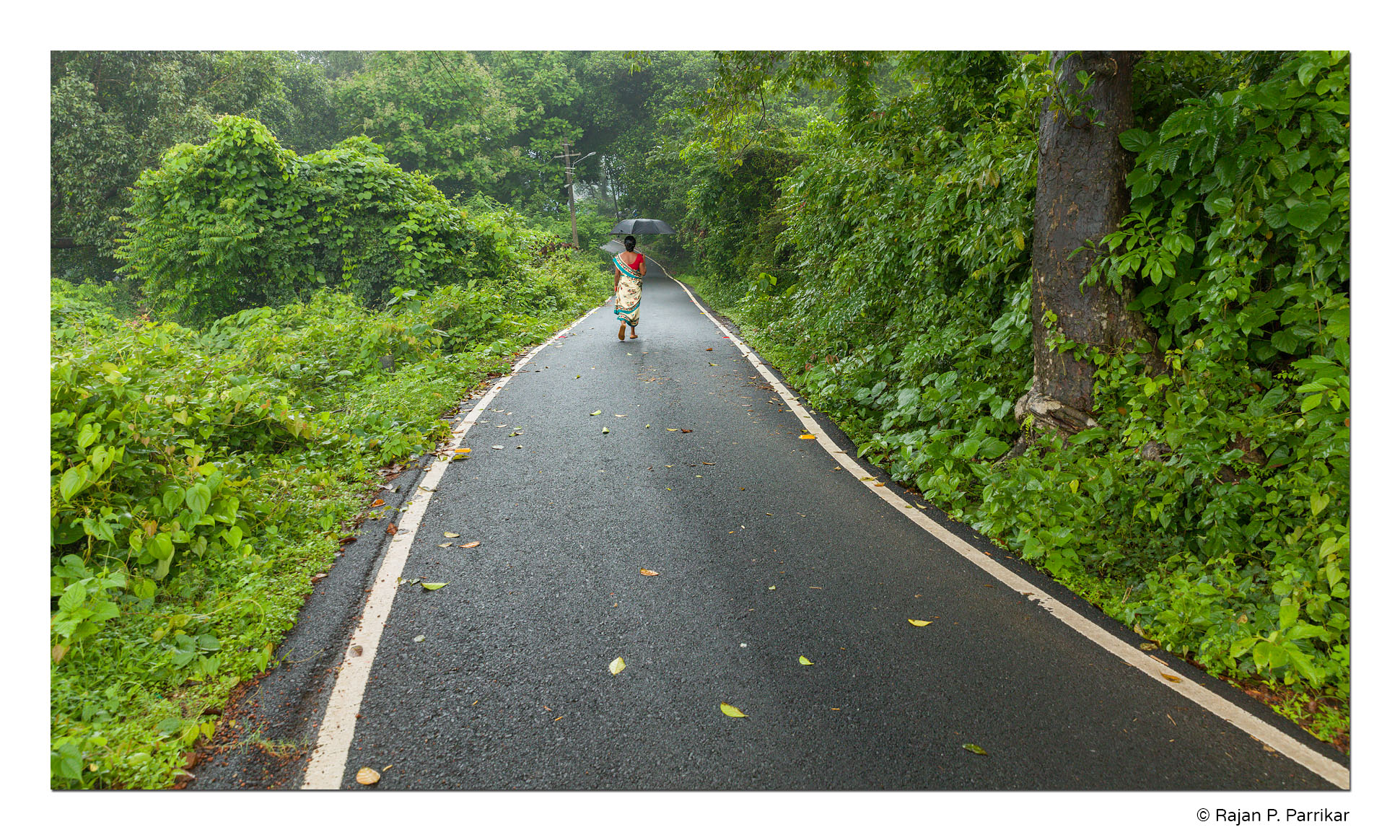 Betqui-Rain-Woman-Walking-Goa